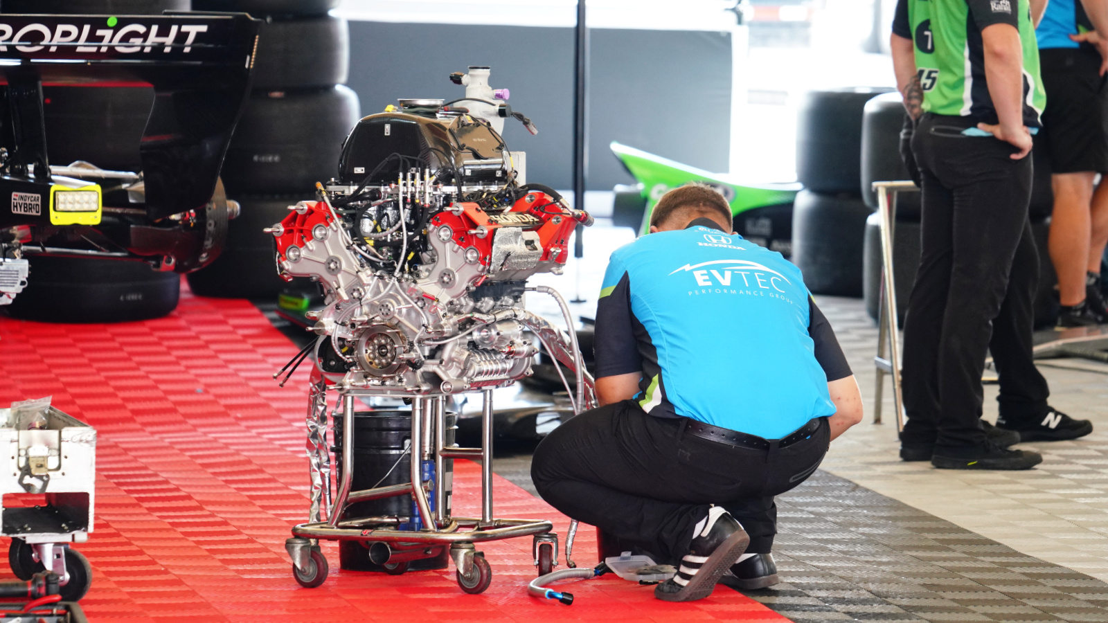 The RLL crew prepares a fresh Honda engine for the #45 entry. Photo: Kevin Dejewski