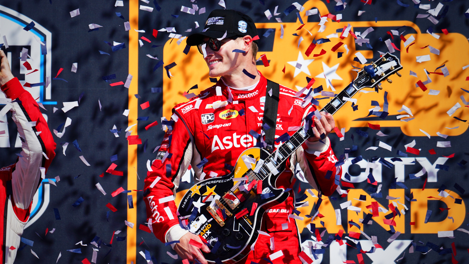 Newgarden celebrated with a special guitar trophy in victory lane. Photo: Kevin Dejewski