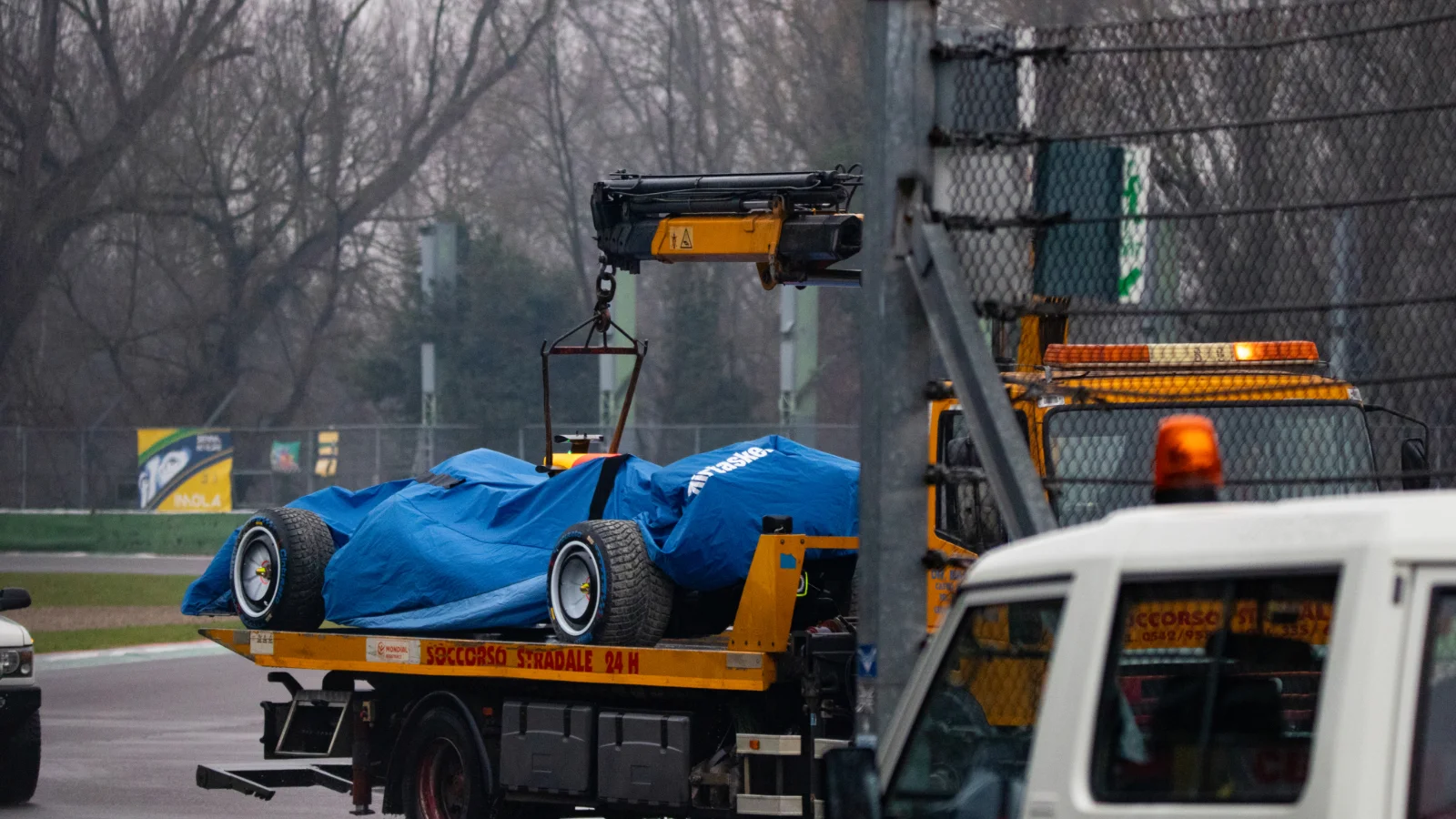 The VCARB 03 was returned to Racing Bulls via a flatbed truck after Arvid Lindblad