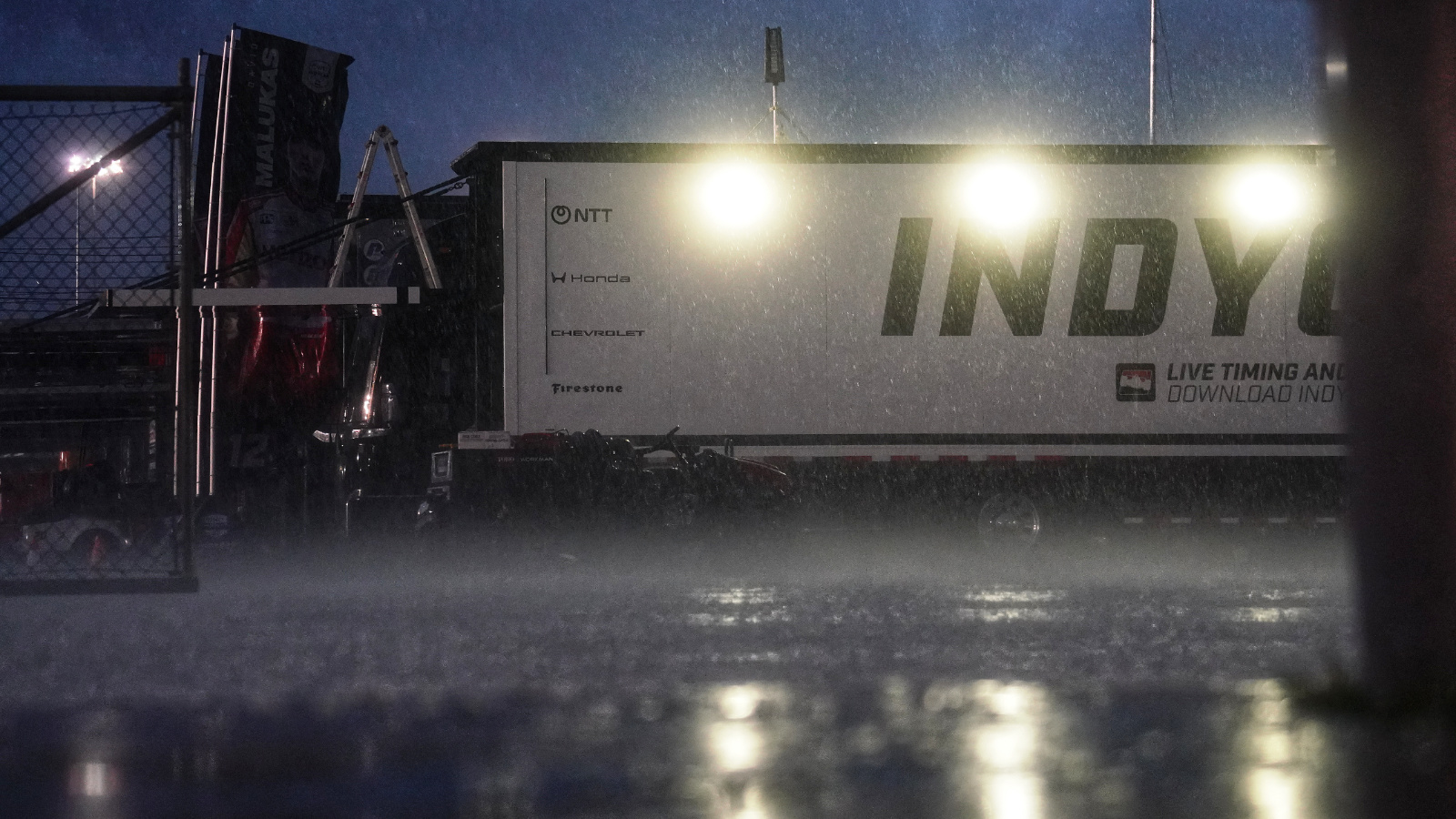 Rain drenched the track as night fell on Sunday. Photo: Kevin Dejewski