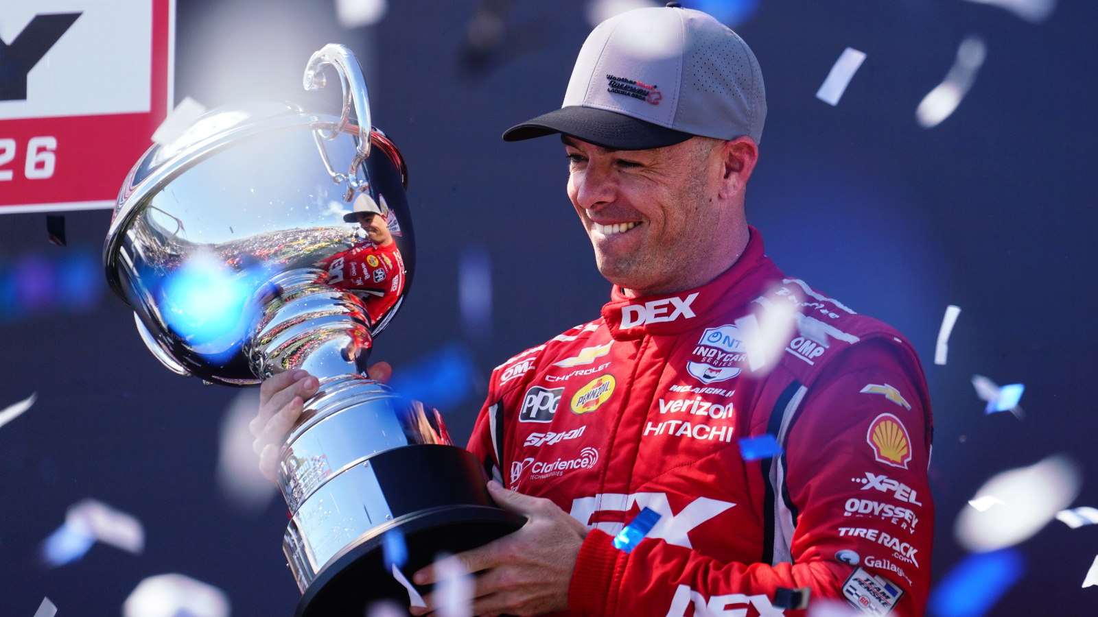 McLaughlin lifts the final race trophy of the season. Photo: Kevin Dejewski