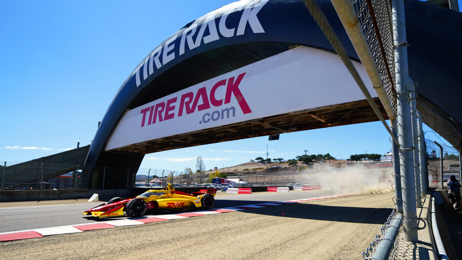 Racing under the iconic bridge at Turn 3. Photo: Kevin Dejewski